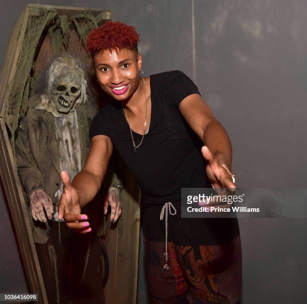 Angel McCoughtry attends 2 Chainz Haunted Pink trap House at 13 Stories on September 19, 2018 in Newnan, Georgia.