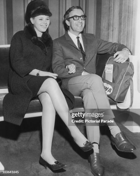 Actress Britt Ekland and her husband, actor Peter Sellers , pictured seated next to each other at John F. Kennedy International Airport, New York,...