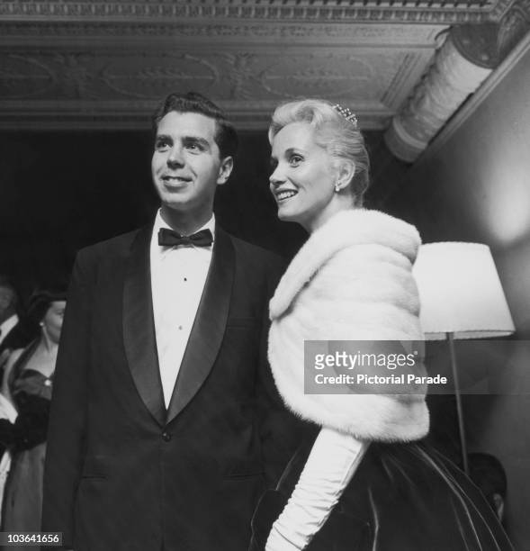 Actress Eva Marie Saint and her husband, director Jeffrey Hayden, pictured dressed in evening wear, USA, circa 1955. Hayden is wearing a tuxedo and...