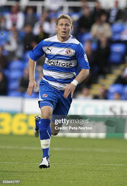 Simon Church of Reading in action during the Carling Cup Round Two match between Reading and Northampton Town at the Madjeski Stadium on August 24,...