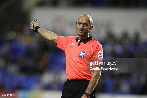Referee Ray East in action during the Carling Cup Round Two match between Reading and Northampton Town at the Madjeski Stadium on August 24, 2010 in...