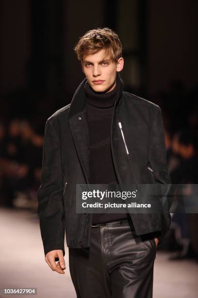 Model wears a creation by French designer Véronique Nichanian as part of Hermès fall/winter 2014/2015 collection presented during the Paris Homme...