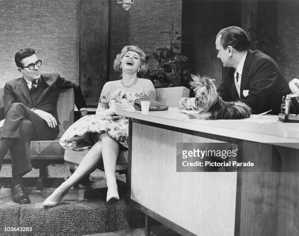 American comedian and talk show host Jack Paar with his guests, Hungarian-born actress Zsa Zsa Gabor and American actor Pat Harrington Jr. On the set...