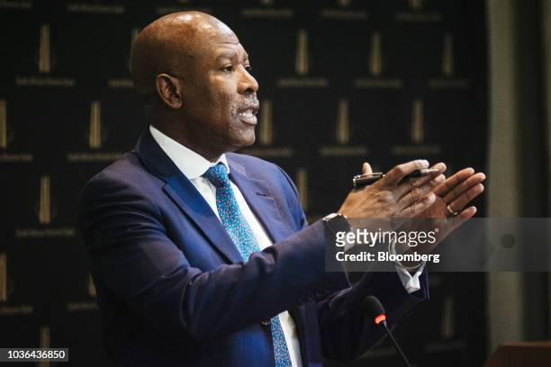 Lesetja Kganyago, governor of South Africa's central bank, gestures as he speaks during a news conference following a Monetary Policy Committee...