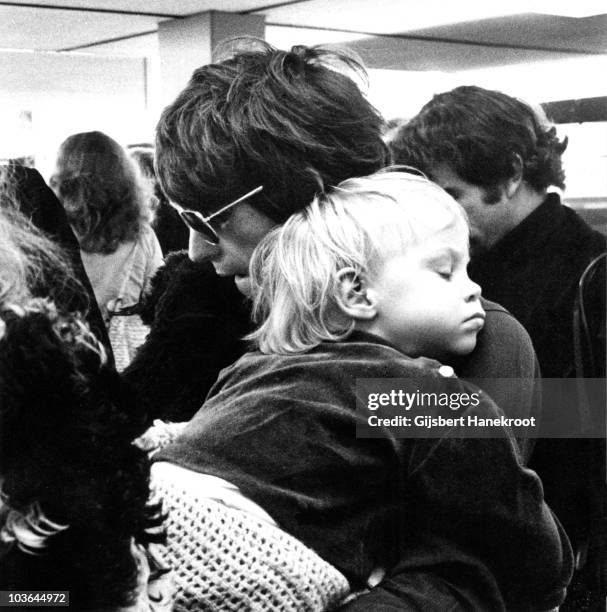 Keith Richards of the Rolling Stones with his son Marlon Richards at Schiphol airport in October 1970 in Amsterdam, Netherlands.