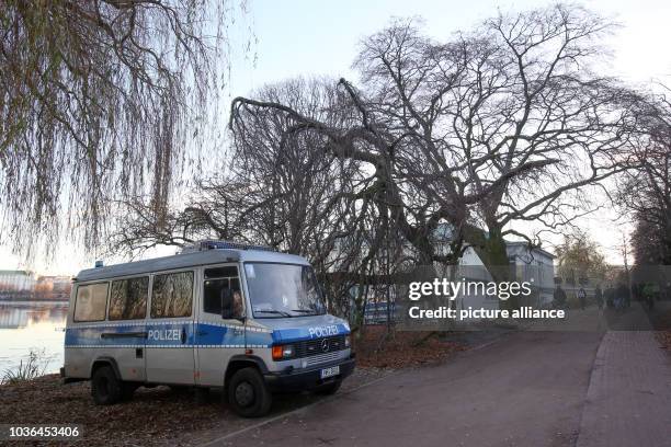Police car is parked at the Germania rowing club at the Alster river in Hamburg, Germany, 5 December 2016. The OSCE Ministerial Council Meeting on 8...