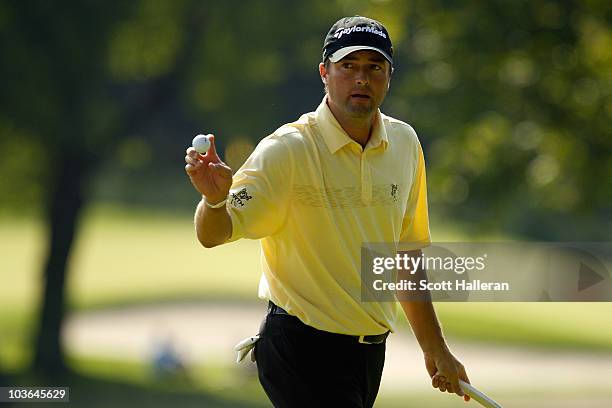 Ryan Palmer reacts after he made a birdie putt on the fifth hole during the first round of The Barclays at the Ridgewood Country Club on August 26,...