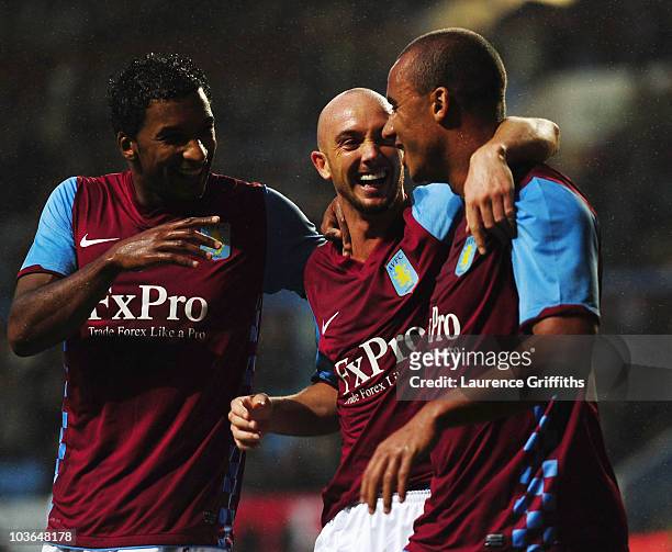 Gabriel Agbonlahor of Aston Villa is congratulated on his goal by Stephen Ireland and Habib Beye during the UEFA Europa League play off second leg...