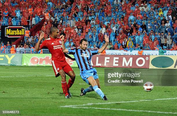 Remzi Giray Karcar of Trabzonspor scores an own goal during the Europa League play off, 2nd leg match between Trabzonspor and Liverpool at Huseyin...