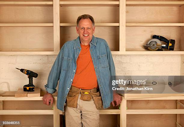 mature carpenter portrait.  - wisconsin house stock pictures, royalty-free photos & images