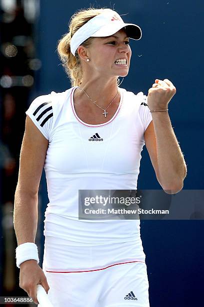 Maria Kirilenko of Russia celebrates a point against Dinara Safina of Russia during the Pilot Pen tennis tournament at the Connecticut Tennis Center...