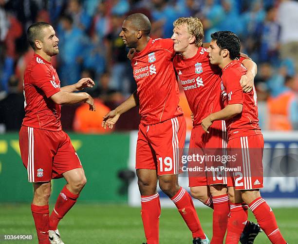 Dirk Kuyt of Liverpool celebrates after scoring the second for Liverpool during the Europa League play off, 2nd leg match between Trabzonspor and...