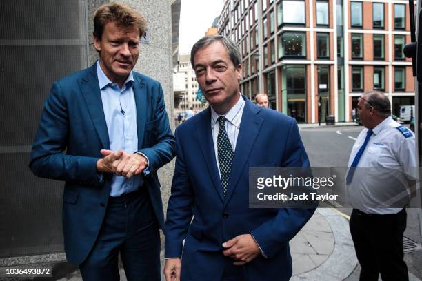 And former leader of the UK Independence Party Nigel Farage and businessman Richard Tice prepare to ride the pro-Brexit 'Leave Means Leave' campaign...
