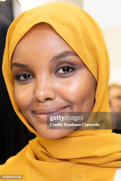 Model Halima Aden is seen backstage ahead of the Max Mara show during Milan Fashion Week Spring/Summer 2019 on September 20, 2018 in Milan, Italy.