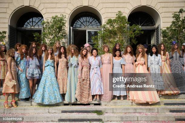 Fashion designer Luisa Beccaria and Lucilla Bonaccorsi aknowledge the applause of the audience after the Luisa Beccaria show during Milan Fashion...