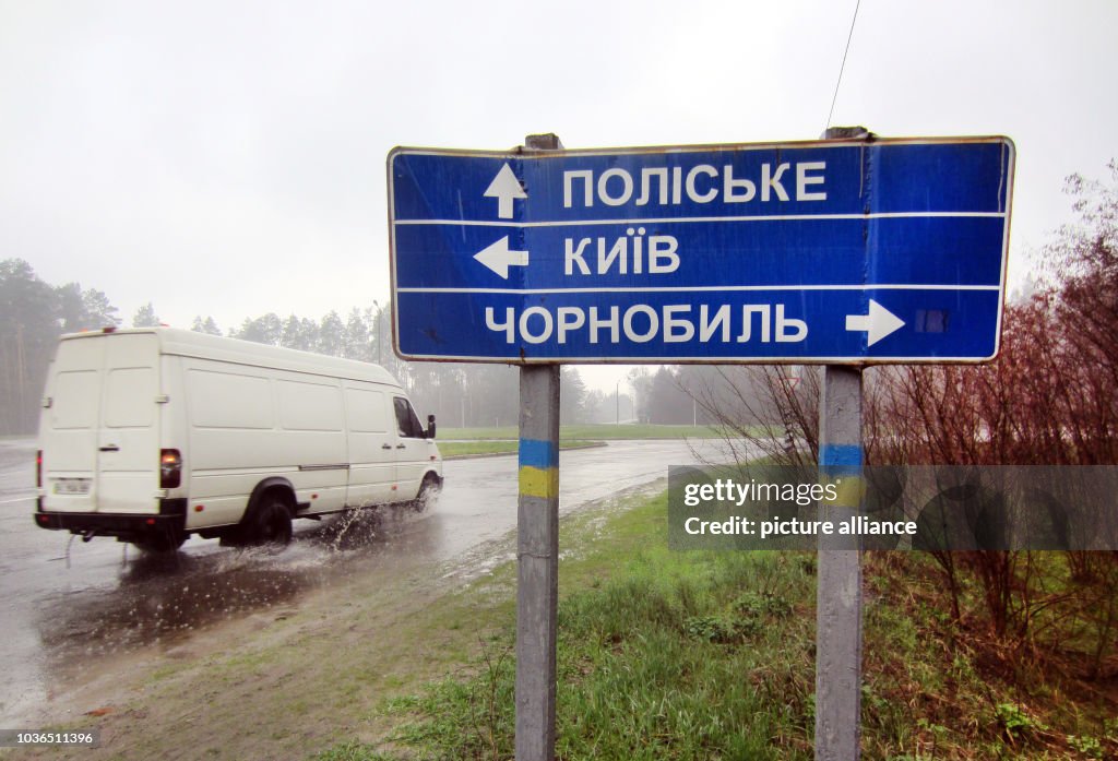 Ivankiv A van travels on the access road to the town of Ivankiv, Ukraine, 13 ...