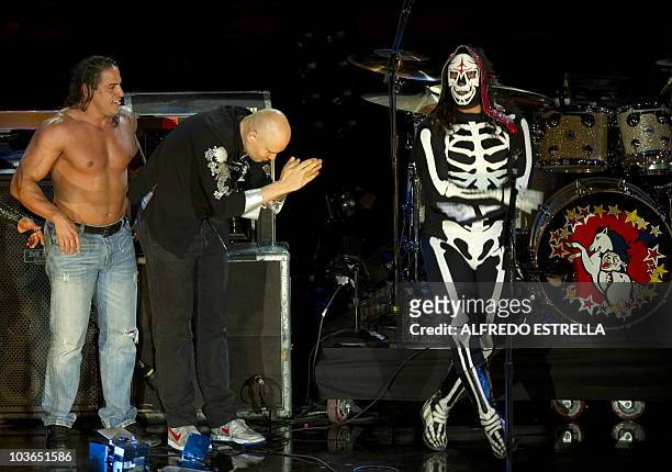 Singer Billy Corgan from the rock band Smashing Pumpkins with Mexican wrestler La Parka during the World Stage of MTV show at the Auditorio Nacional...