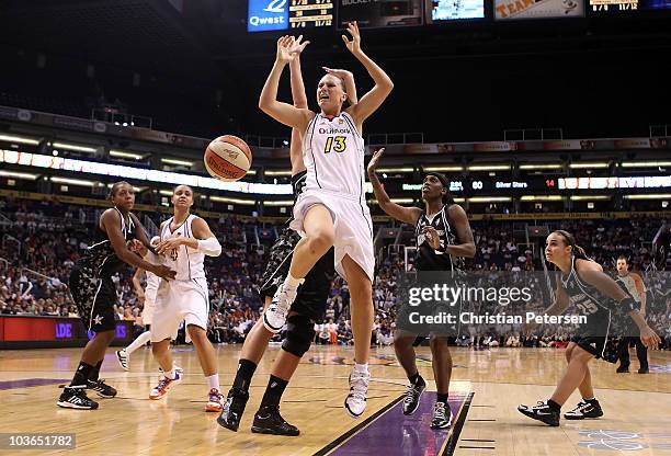 Penny Taylor of the Phoenix Mercury loses the ball as she drives to the basket in Game One of the Western Conference Semifinals against the San...