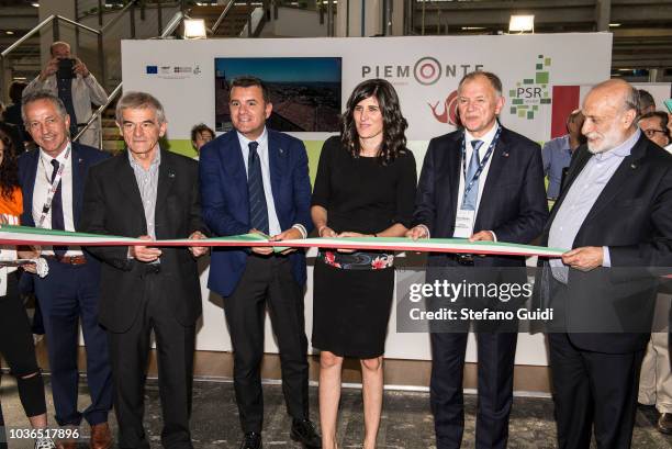 Sergio Chiamparino, Gian Marco Centinaio, Chiara Appendino,Vytenis Andriukaitis and Carlo Petrini during during the ribbon cutting for the...