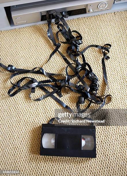 stuck video tape - cassette stock pictures, royalty-free photos & images