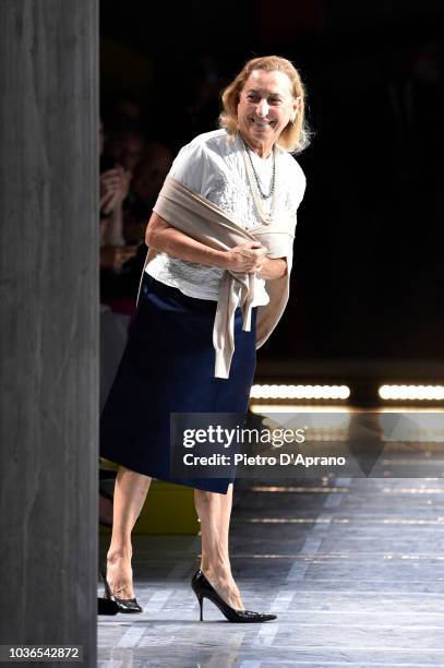 Designer Miuccia Prada acknowledges the applause of the audience at the Prada show during Milan Fashion Week Spring/Summer 2019 on September 20, 2018...