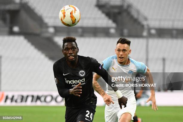 Frankfurt's German defender Danny da Costa vies for the ball with Marseille's Argentine midfielder Lucas Ocampos during the UEFA Europa League Group...