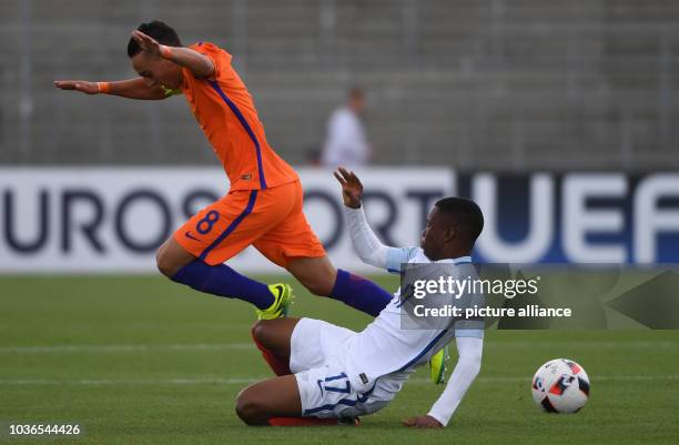 Abdelhak Nouri of the Netherlands in action against England's Ademola Lookman during the UEFA European Under-19 Championship group stage soccer match...