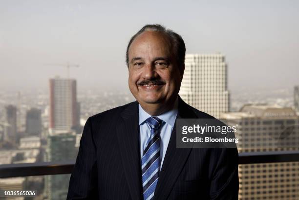 Larry Merlo, chief executive officer of CVS Health Corp., stands for a photograph after a Bloomberg Television interview in Los Angeles, California,...