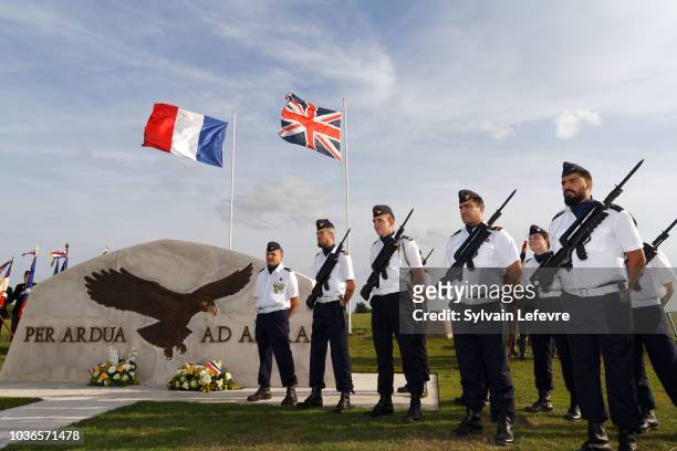 Soldiers stand guard during the commemoration of centenary of the Royal Air Force , at the Cemetery des Souvenirs in Longuenesse, near Saint-Omer, on...