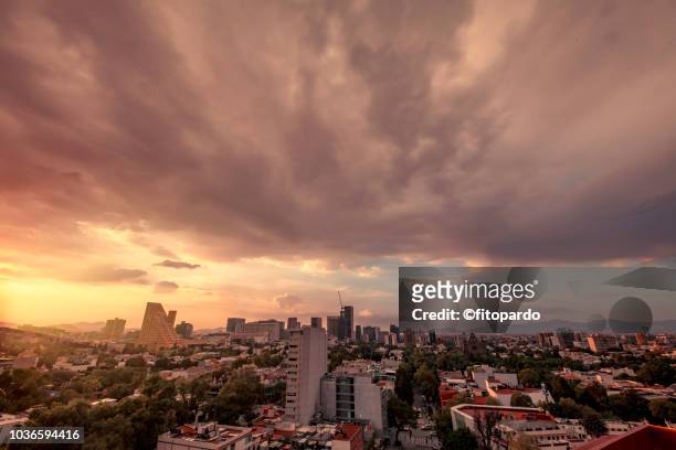 day and night over mexico city - mexico city night stock pictures, royalty-free photos & images