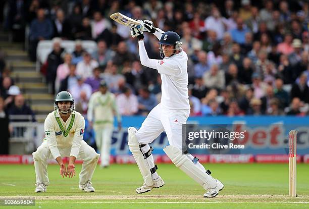 Stuart Broad of England hits out watched by Azhar Ali of Pakistan during day two of the 4th npower Test Match between England and Pakistan at Lord's...