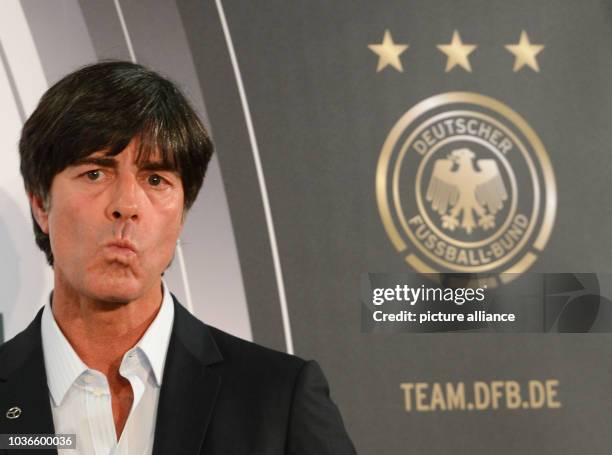 Head coach of the German national soccer team Joachim Loew looks on during a press conference at the headquarters of the German Football Association...