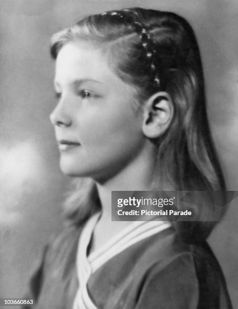 Actress Lauren Bacall pictured as a young child, aged ten, in her first professional portrait, taken by photographer John Robert Powers, USA, circa...
