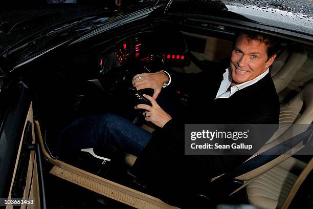 Actor David Hasselhoff sits in his KITT car from the seies "Knight Rider" while attending The Dome 55 on August 27, 2010 in Hannover, Germany.