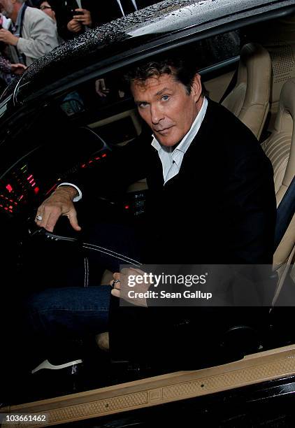 Actor David Hasselhoff sits in his KITT car from the seies "Knight Rider" while attending The Dome 55 on August 27, 2010 in Hannover, Germany.