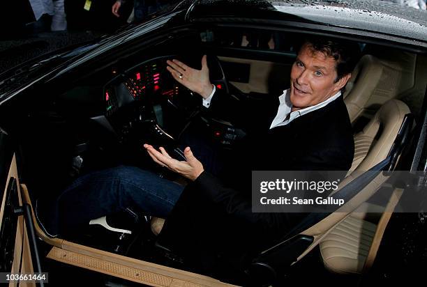 Actor David Hasselhoff sits in his KITT car from the seies "Knight Rider" while attending The Dome 55 on August 27, 2010 in Hannover, Germany.