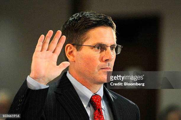 Brett Cocales, drilling engineer for BP Plc, is sworn in during the Deepwater Horizon joint investigation hearings conducted by the U.S. Coast Guard...