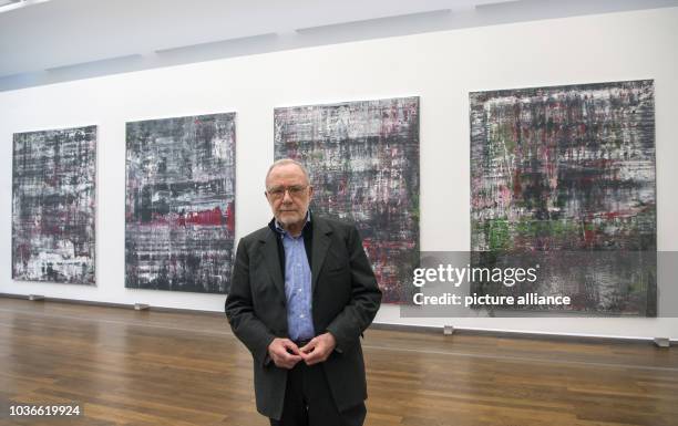 Artist Gerhard Richter stands in front of his piece 'Birkenau' in the Frieder Burda Museum in Baden-Baden, Germany, 04 February 2016. The piece is...