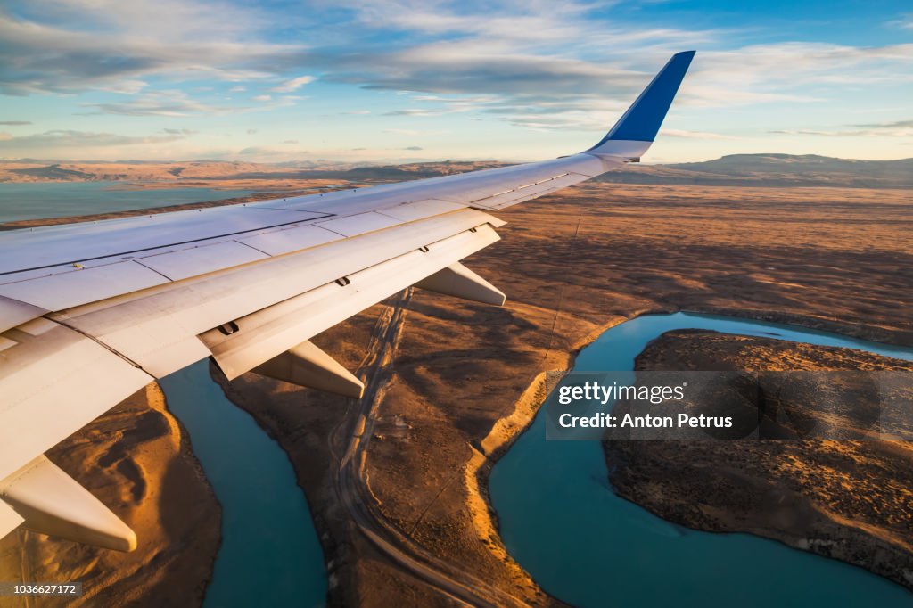 Beautiful view of airplane wing over the Argentine pampas