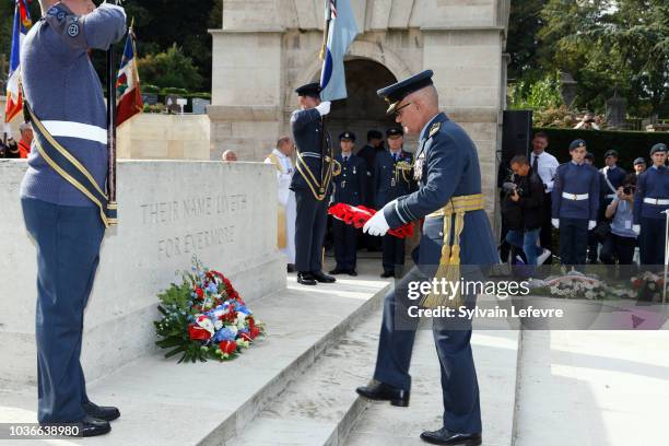 Air Marshal Stuart Evans, Deputy Commander of NATOs Allied Air Command at Ramstein Air Base lays a poppy wreath at the Stone of Remembrance during...