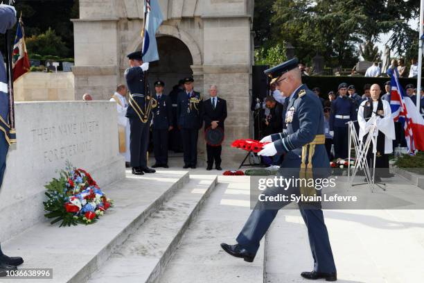 Air Marshal Stuart Evans, Deputy Commander of NATOs Allied Air Command at Ramstein Air Base lays a poppy wreath at the Stone of Remembrance during...