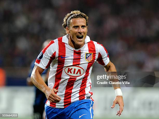 Diego Forlan of Atletico Madrid competes for the ball during the UEFA Super Cup between Inter and Atletico Madrid at Louis II Stadium on August 27,...