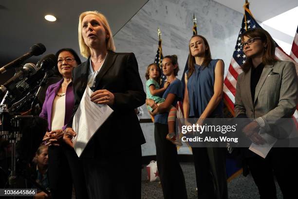 Sen. Kirsten Gillibrand holds a letter signed by Holton-Arms alumnae in support of Christine Blasey Ford, who has accused Supreme Court nominee Judge...
