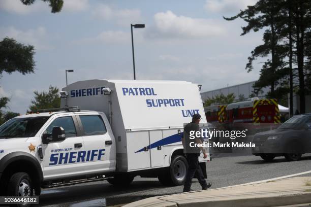 Police barricade the entrance to a a Rite Aid Distribution Center, where multiple people were killed and injured in a shooting on September 20, 2018...