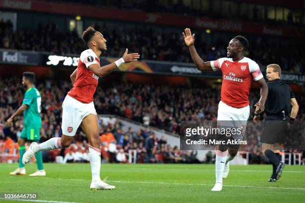 Pierre-Emerick Aubameyang of Arsenal celebrates scoring the opening goal with c during the UEFA Europa League Group E match between Arsenal and...