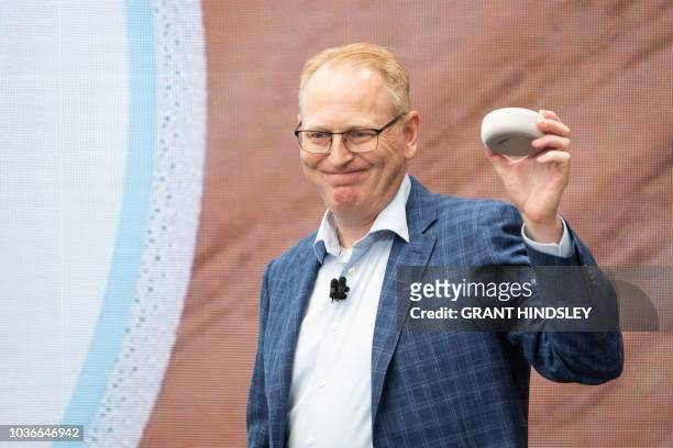 Dave Limp, senior vice president of Amazon devices, announces the new Echo Dot at The Spheres in Seattle on September 20, 2018. - Amazon weaves its...