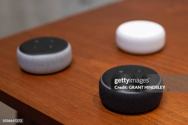 The updated Echo Dot, is displayed in Amazon's Day 1 building in Seattle on September 20, 2018. - Amazon weaves its Alexa digital assistant into more...