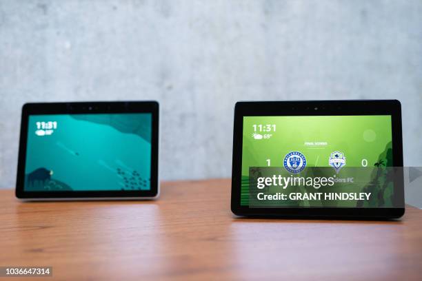 The updated Echo Show,is on display in Amazon's Day 1 building in Seattle on September 20, 2018. - Amazon weaves its Alexa digital assistant into...