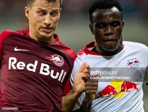 Leipzig´s Portuguese forward Bruma and Salzburg´s Austrian defender Stefan Lainer vie during the UEFA Euro League group B match between RB Leipzig...