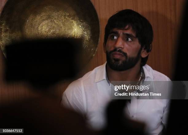 Wrestler Bajrang Puniya addresses the media during a press conference at Connaught Place, on September 20, 2018 in New Delhi, India. The wrestler...